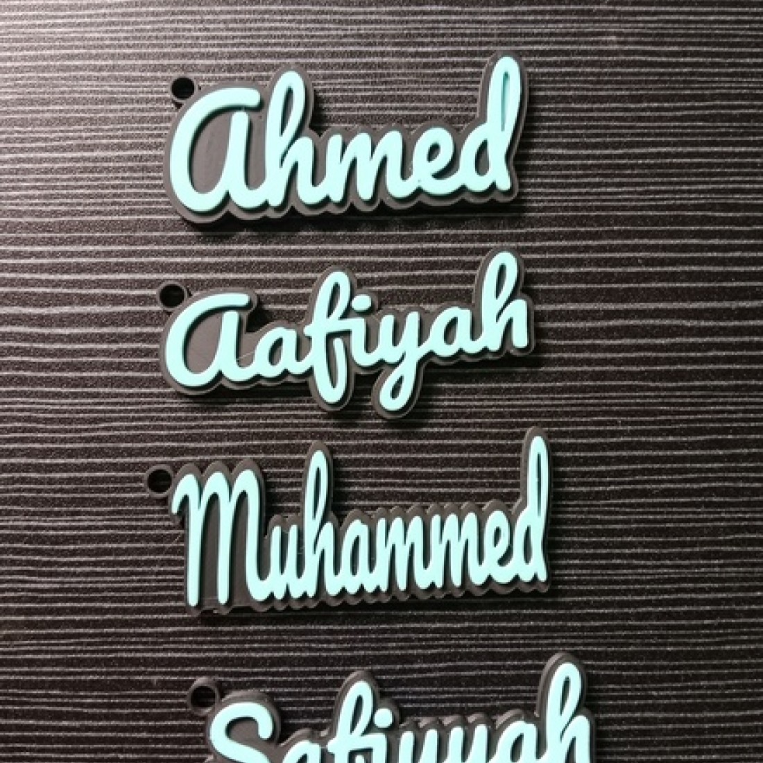 Keychain Cursive Personalized English Name Keychains (black with blue cursive text)